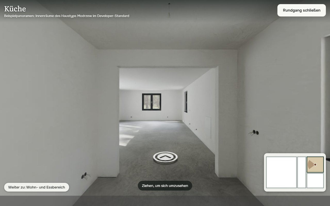 360°-Rundgang durch die Küche im Developer-Standard mit Blick in den Wohnbereich, Schaltfläche zum nächsten Raum und Mini-Grundriss mit Standort und Blickrichtung